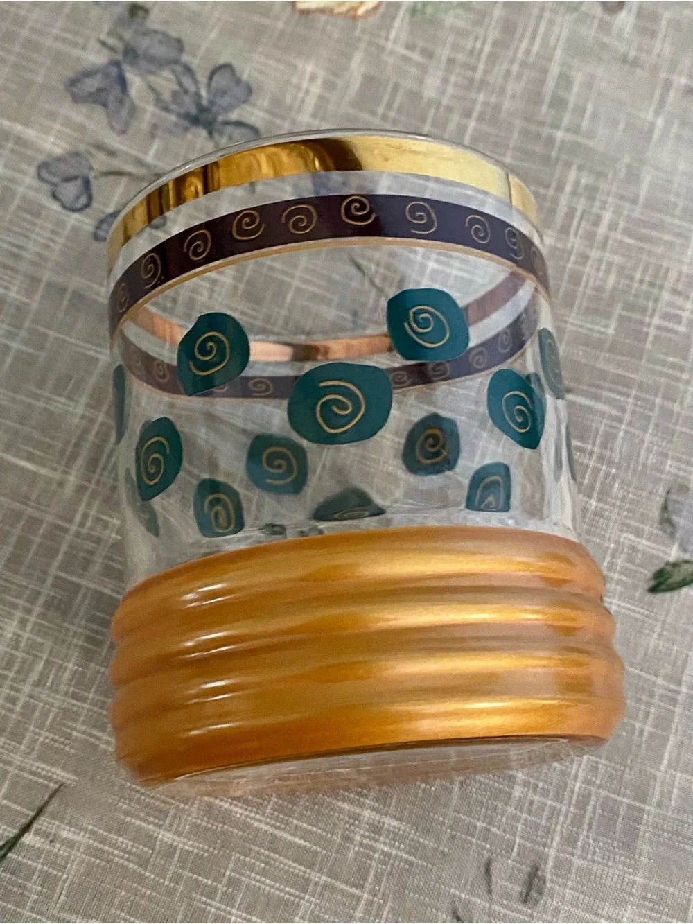 Sakura Gold-Trimmed Glass Tumbler with Teal Spirals and Copper Base